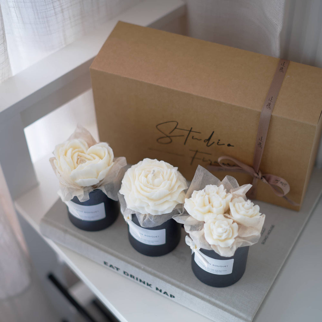 Blumenbouquet-Kerzen À Fleur de Coeur vor dem Geschenkkarton